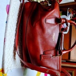 Coach Saddle Brown Leather Legacy Medium Shoulder Bag with Tassel.